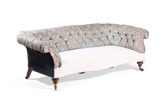 AN EARLY VICTORIAN WALNUT SERPENTINE FRONTED 'CHESTERFIELD' SOFA, BY HOWARD & SONS