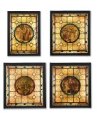 A SET OF FOUR ARTS AND CRAFTS STAINED GLASS PANELS, CIRCA 1880-1900