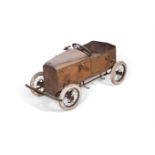 A CHILD'S TIN MODEL PEDAL CAR, EARLY 20TH CENTURY