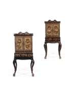 Y A MATCHED PAIR OF CHINESE EXPORT BLACK LACQUER AND CHINOISERIE DECORATED CABINETS ON STANDS