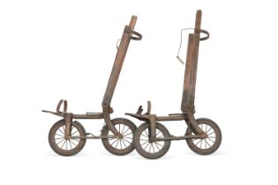AN UNUSUAL PAIR OF CAST METAL AND WOOD 'RITTER SKATES', PROBABLY BY THE ROAD SKATE CO.