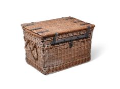 A LARGE WICKER, IRON BOUND AND STITCHED LEATHER STORAGE OR LOG BASKET, EARLY 20TH CENTURY