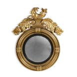 A REGENCY GILTWOOD CIRCULAR CONVEX MIRROR, CIRCA 1820