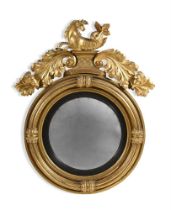 A REGENCY GILTWOOD CIRCULAR CONVEX MIRROR, CIRCA 1820