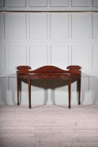 A PAIR OF GEORGE III MAHOGANY SEMI-ELLIPTICAL CONSOLE OR SERVING TABLES, CIRCA 1800
