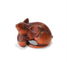 A JAPANESE CARVED FRUITWOOD NETSUKE, 19TH CENTURY