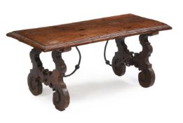 A SPANISH CARVED WALNUT AND WROUGHT IRON COFFEE TABLE, EARLY 19TH CENTURY