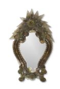 A SMALL SCULPTED GLASS FRAMED MIRROR, ALMOST CERTAINLY MURANO
