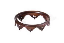 A WILLIAM IV FIGURED WALNUT BED CROWNIN THE MANNER OF GILLOWS, CIRCA 1835