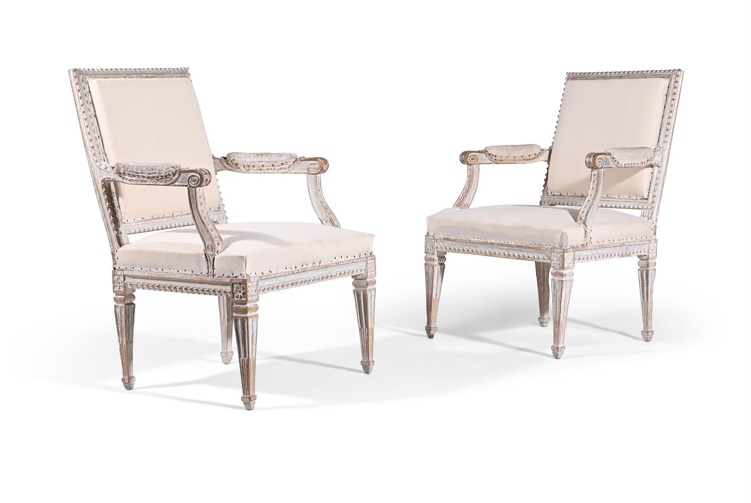 A PAIR OF LOUIS XVI PAINTED BEECH AND UPHOLSTERED FAUTEUILS, LATE 18TH CENTURY