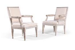 A PAIR OF LOUIS XVI PAINTED BEECH AND UPHOLSTERED FAUTEUILS, LATE 18TH CENTURY