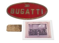 A CAST BRASS OR BRONZE AND PAINTED SIGN FOR 'BUGATTI'