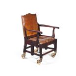 A GEORGE IV MAHOGANY AND LEATHER UPHOLSTERED CAMPAIGN SEDAN CHAIR, CIRCA 1825