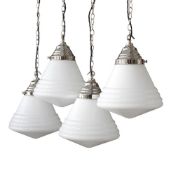 A SET OF FOUR 'THE GRACE' NICKEL PLATED AND OPALINE GLASS PENDANT LIGHTS, BY DREW PRITCHARD LTD