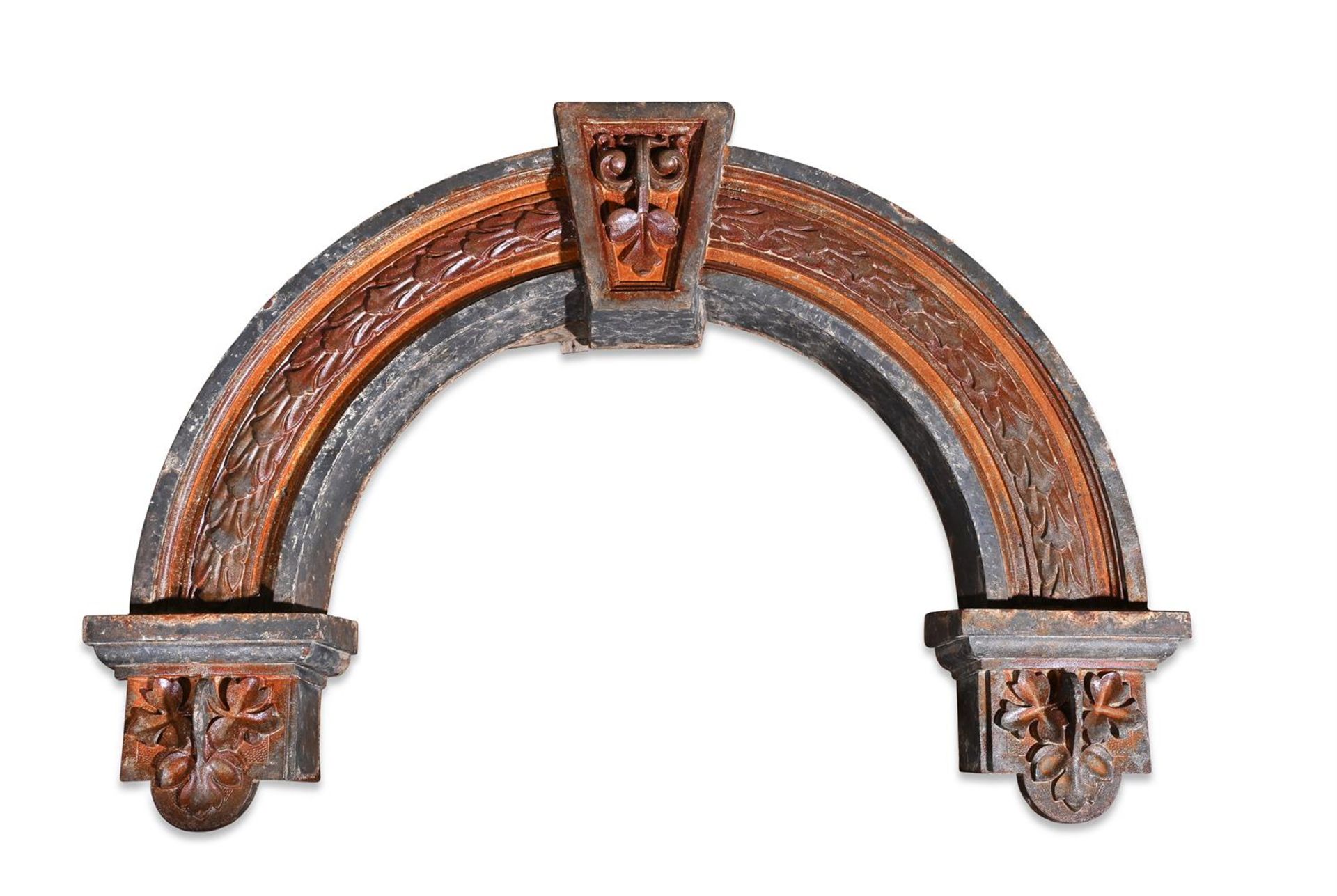 A LARGE CAST IRON AND POLYCHROME PAINTED ARCH OR OVERDOOR, EARLY 20TH CENTURY