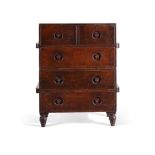 Y AN EXOTIC HARDWOOD NAVAL CAMPAIGN CHEST OF DRAWERS, EARLY 19TH CENTURY