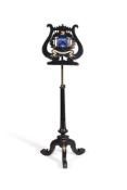 A VICTORIAN EBONISED AND POLYCHROME PAINTED ADJUSTABLE MUSIC STAND, LATE 19TH CENTURY