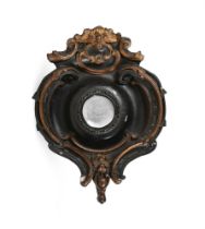 OF NAVAL INTEREST: A CARVED, EBONISED AND PARCEL GILT SHIP’S MIRROR, LATE 19TH OR EARLY 20TH CENTURY