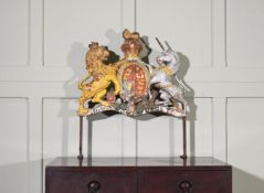 A CAST IRON AND POLYCHROME PAINTED ROYAL COAT OF ARMS, 19TH CENTURY