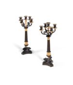 A PAIR OF LOUIS PHILIPPE BRONZE AND GILT BRONZE FIVE BRANCH CANDELABRA, CIRCA 1835