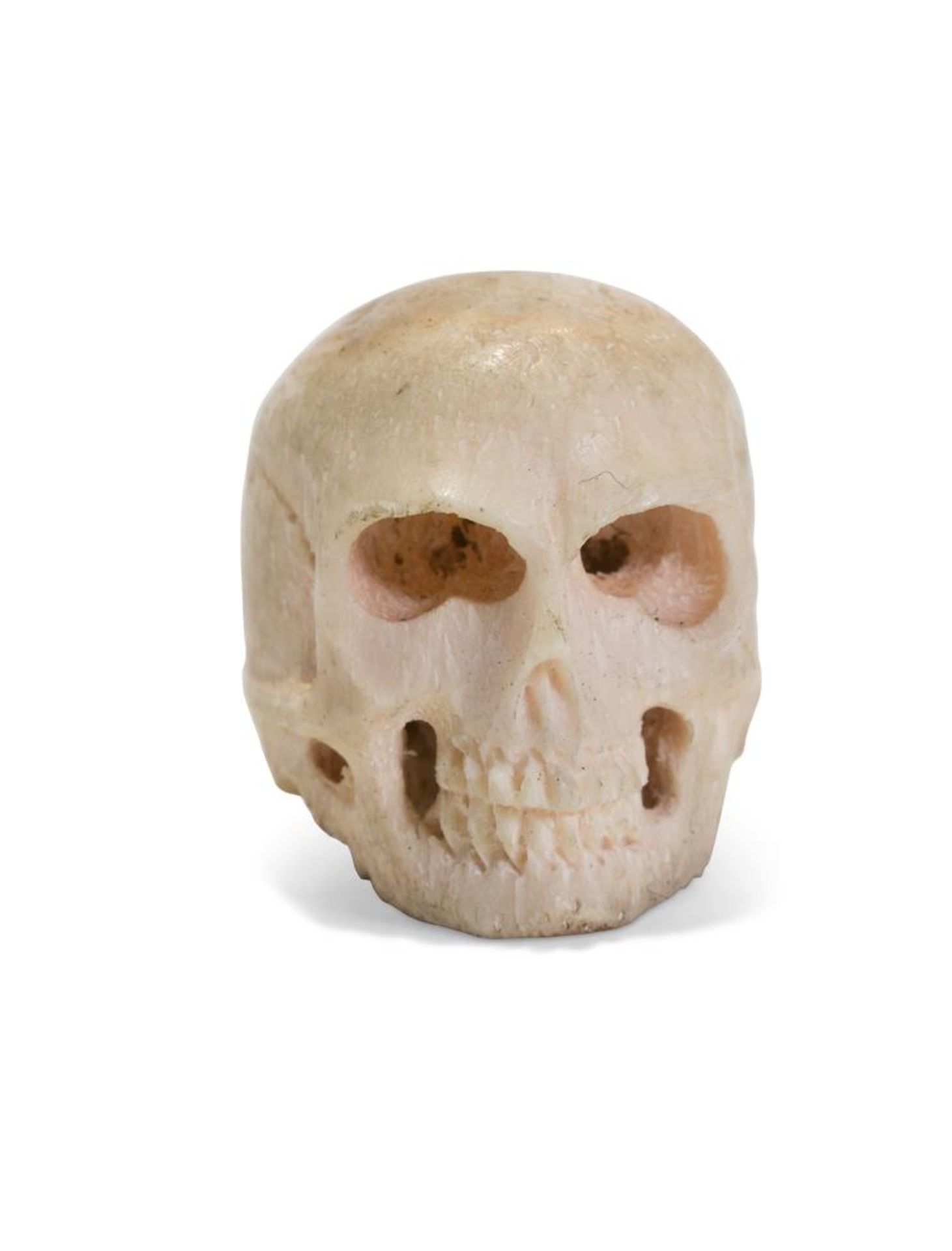 A TINY CARVED BONE MODEL OF A SKULL, PROBABLY JAPANESE OR ITALIAN - Image 2 of 2