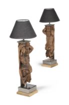 A PAIR OF CARVED WALNUT FIGURAL LAMPS, 19TH CENTURY