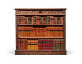 Y A CARVED OAK AND SPECIMEN PARQUETRY OPEN BOOKCASE, ATTRIBUTED TO L & S LÖVINSON OF BERLIN
