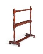 A GEORGE IV MAHOGANY BOOT AND WHIP RACK, CIRCA 1825