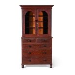 A VICTORIAN 'GRAINED' PINE BOOKCASE, CIRCA 1840