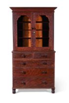 A VICTORIAN 'GRAINED' PINE BOOKCASE, CIRCA 1840