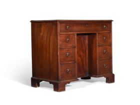 A GEORGE III MAHOGANY KNEEHOLE DESK, ATTRIBUTED TO THOMAS CHIPPENDALE, CIRCA 1775