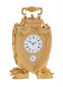 A FINE AND RARE ENGRAVED GILT BRASS SHIELD-SHAPED REPEATING ALARM CARRIAGE CLOCK