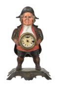 AN AMERICAN POLYCHROME PAINTED CAST IRON FIGURAL BLINKING EYE NOVELTY MANTEL TIMEPIECE