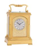 A FINE VICTORIAN GILT BRASS GIANT CARRIAGE CLOCK WITH PUSH-BUTTON REPEAT