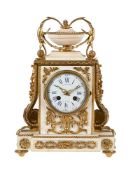 A FRENCH LOUIS XVI STYLE ORMOLU MOUNTED WHITE MARBLE MANTEL CLOCK