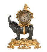 FRENCH LOUIS XV STYLE PATINATED AND GILT BRONZE MANTEL TIMEPIECE 'PENDULE A L'ELEPHANT'