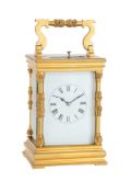 A FRENCH GILT BRASS CARRIAGE CLOCK WITH PUSH-BUTTON REPEAT