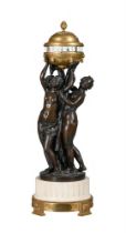 A FINE FRENCH BRONZE AND ORMOLU MOUNTED MARBLE FIGURAL CERCLE TOURNANTS ‘PENDULE AUX TROIS GRACES’