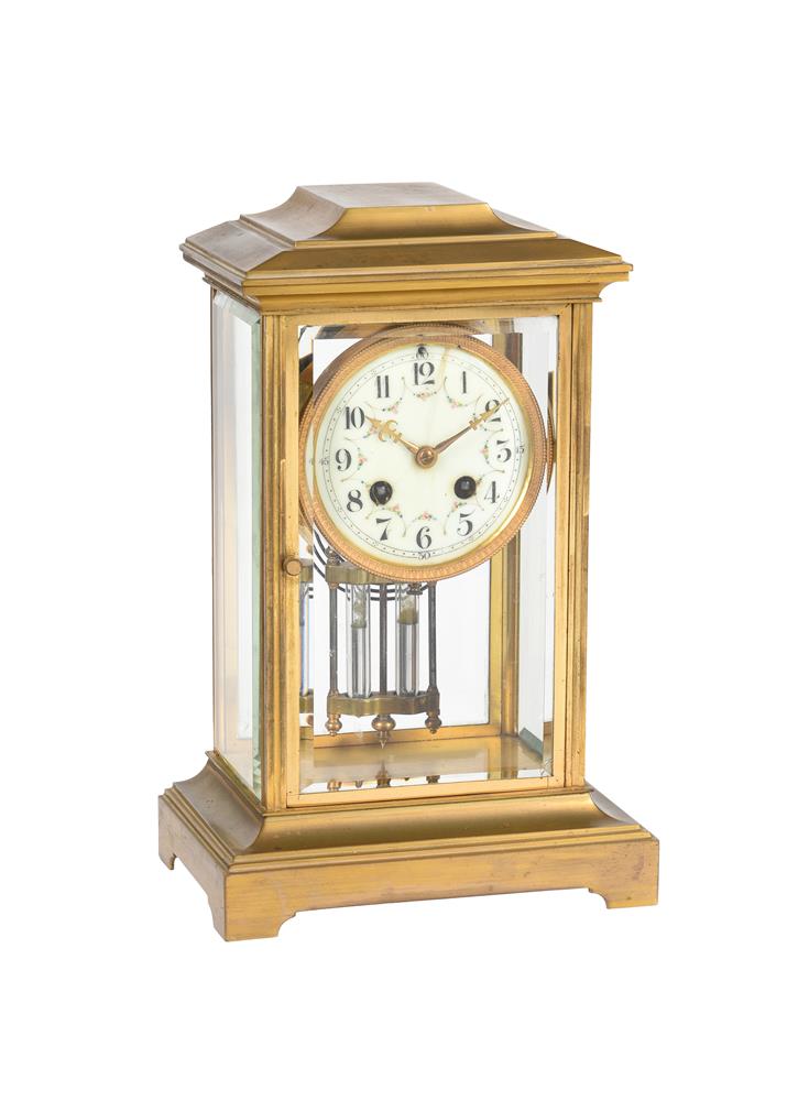 A FRENCH LACQUERED BRASS FOUR-GLASS MANTEL CLOCK