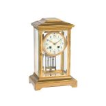 A FRENCH LACQUERED BRASS FOUR-GLASS MANTEL CLOCK