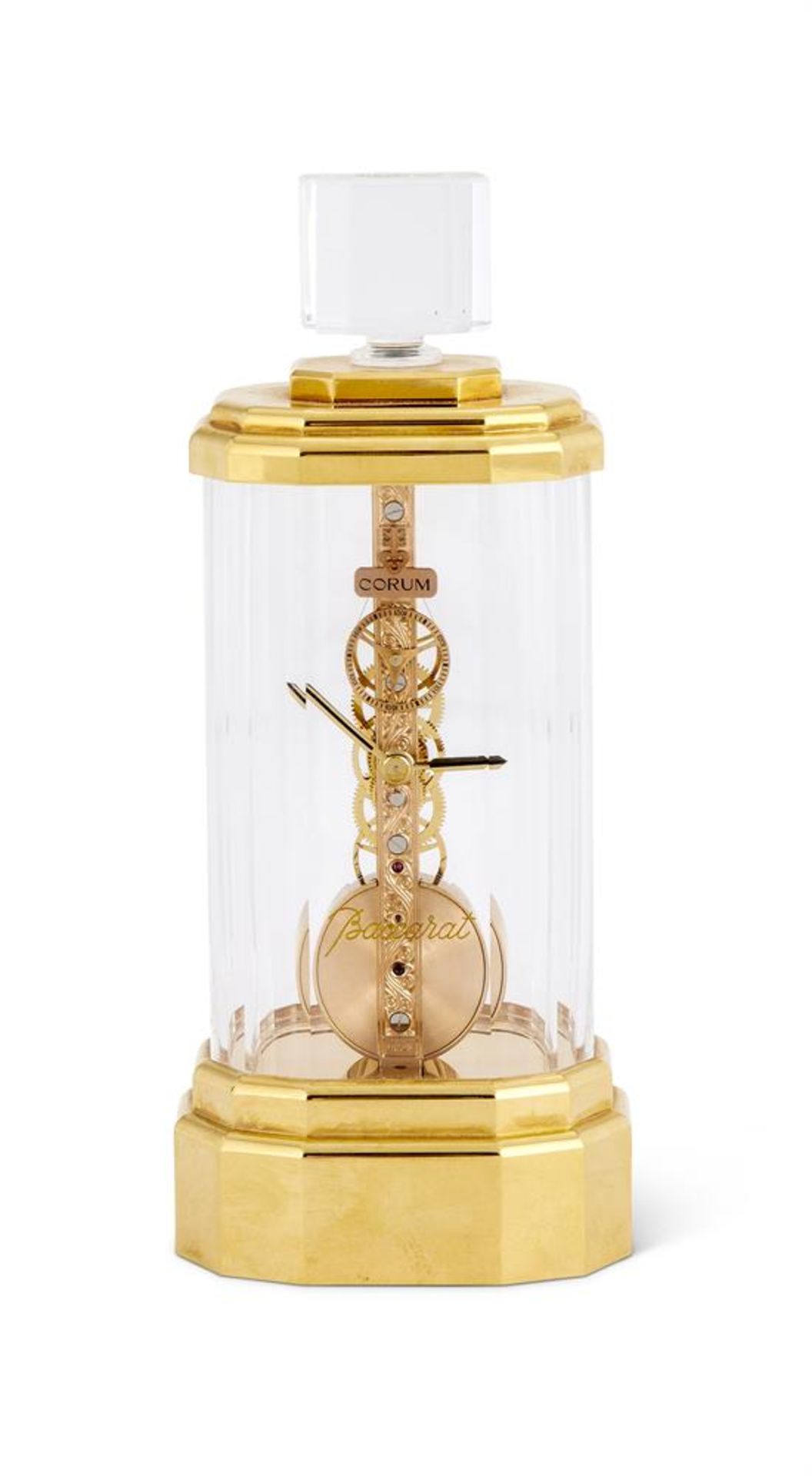 A CONTEMPORARY BACCARAT CRYSTAL AND GILT METAL DESK TIMEPIECE IN THE FORM OF A SCENT BOTTLE