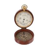 A GILT BRASS ANEROID POCKET WEATHER FORETELLER BOROMETER OR ‘WEATHER WATCH’