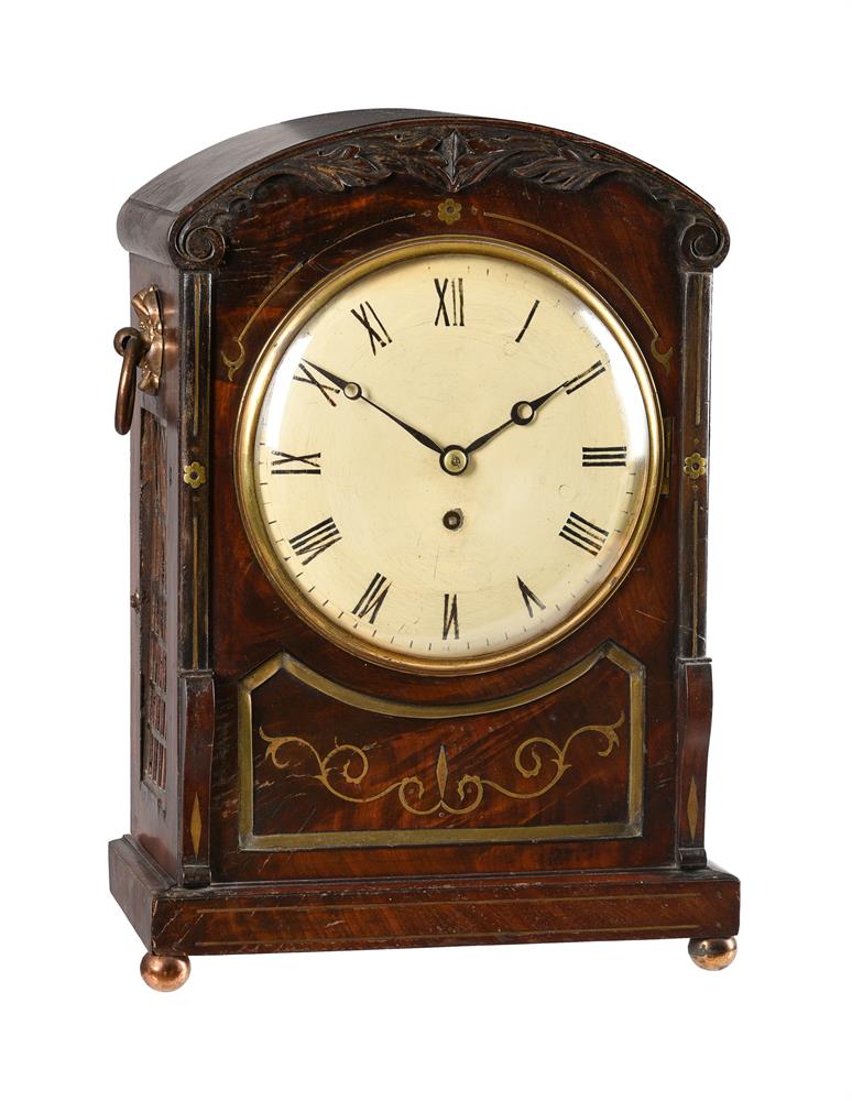 A WILLIAM IV BRASS INLAID CARVED MAHOGANY BRACKET TIMEPIECE