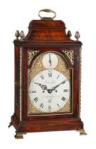 A GEORGE III BRASS MOUNTED FIGURED MAHOGANY TABLE/BRACKET CLOCK WITH TRIP-HOUR REPEAT