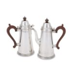 A PAIR OF SILVER TAPERING CAFE AU LAIT POTS