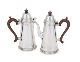 A PAIR OF SILVER TAPERING CAFE AU LAIT POTS