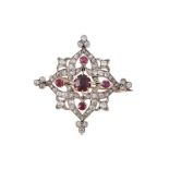 A LATE VICTORIAN RUBY AND DIAMOND QUATREFOIL BROOCH/PENDANT, CIRCA 1890