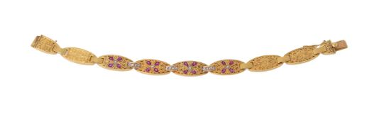 AN EARLY 20TH CENTURY RUBY AND DIAMOND BRACELET