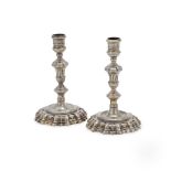 A PAIR OF IRISH SILVER GILT CANDLESTICKS