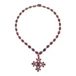 A REGENCY GARNET AND GOLD RIVIERE NECKLACE WITH DROP PENDANT, CIRCA 1820
